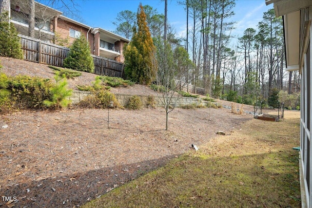 view of yard featuring fence