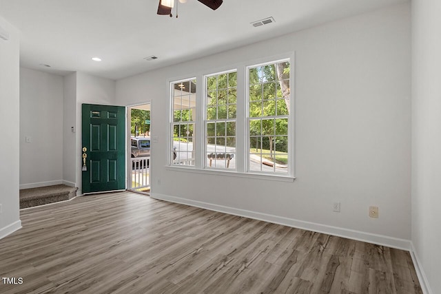 entrance foyer featuring ceiling fan and light hardwood / wood-style flooring