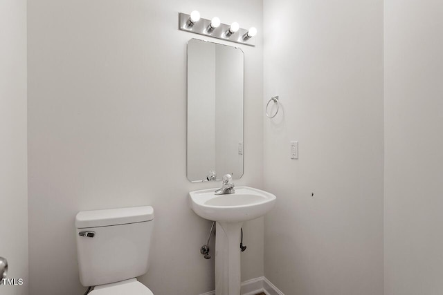 bathroom featuring toilet