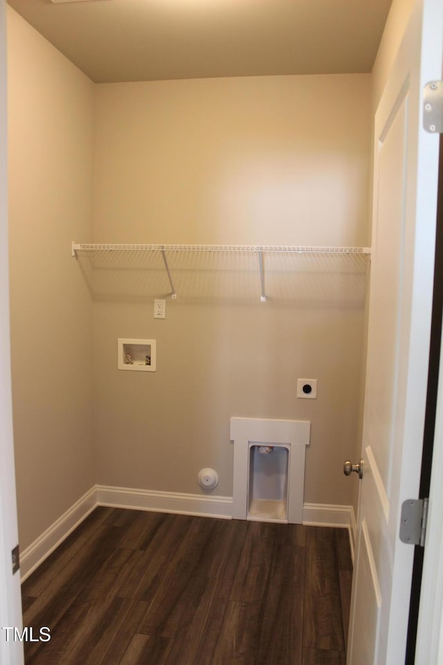 clothes washing area featuring dark hardwood / wood-style flooring, hookup for a washing machine, and electric dryer hookup