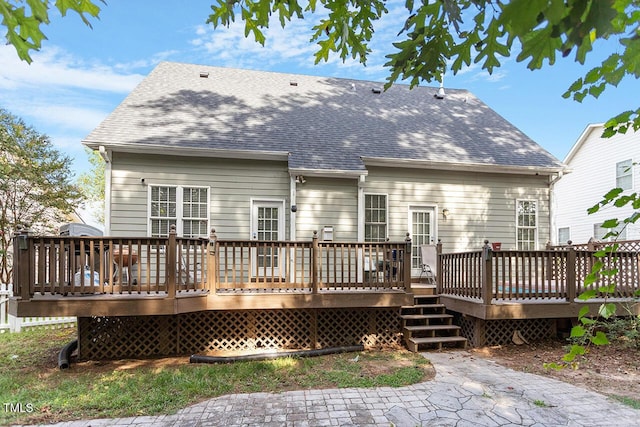 back of house with a patio and a deck