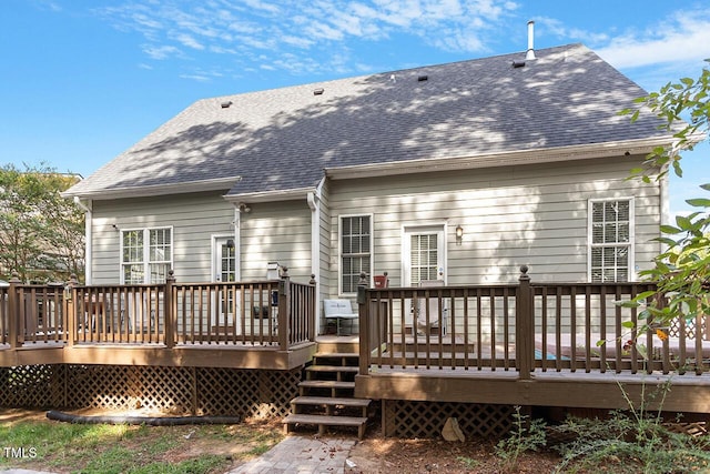 rear view of house with a deck