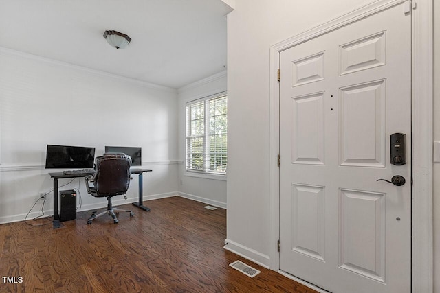 home office with ornamental molding and dark hardwood / wood-style floors