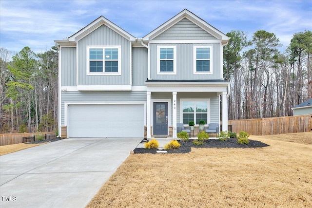 view of front facade featuring a garage and a front yard