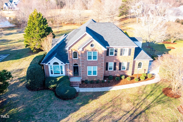 view of front of property with a front lawn