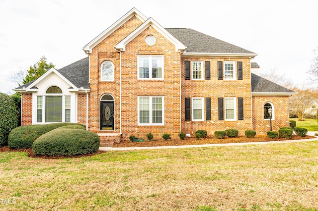 view of front of house with a front lawn