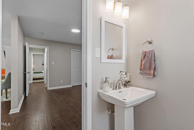 bathroom featuring wood-type flooring