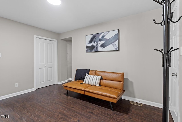 living area with dark wood-type flooring