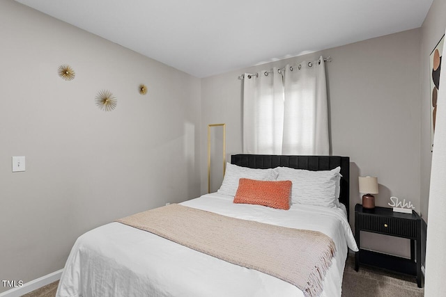 bedroom featuring carpet