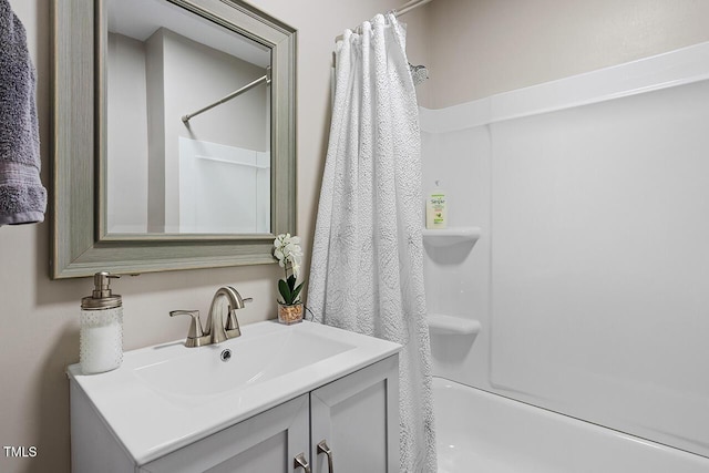 bathroom with vanity and shower / bathtub combination with curtain