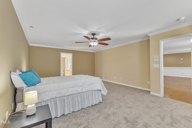 carpeted bedroom featuring visible vents, baseboards, a ceiling fan, and ornamental molding