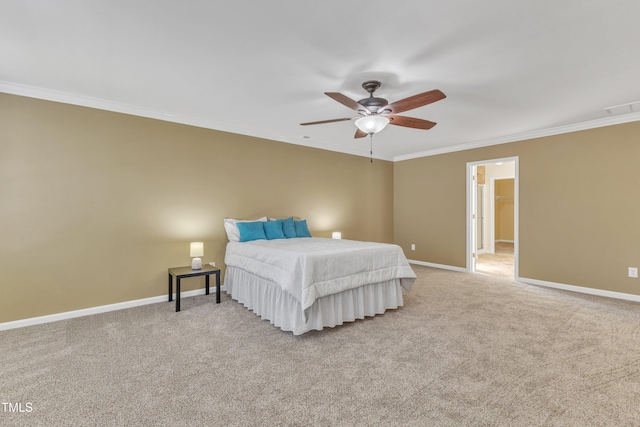 bedroom with visible vents, baseboards, light carpet, and crown molding