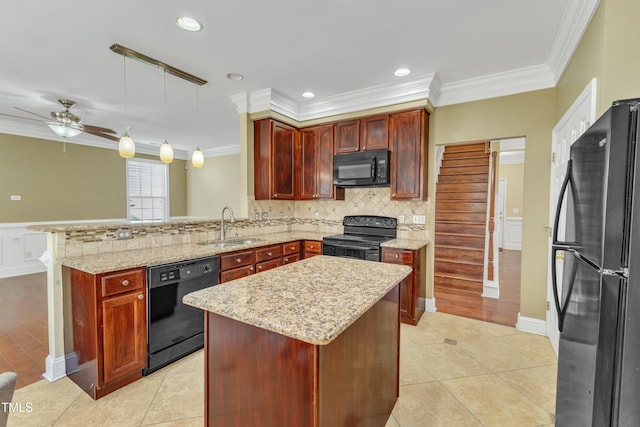 kitchen with a peninsula, ceiling fan, a sink, black appliances, and backsplash