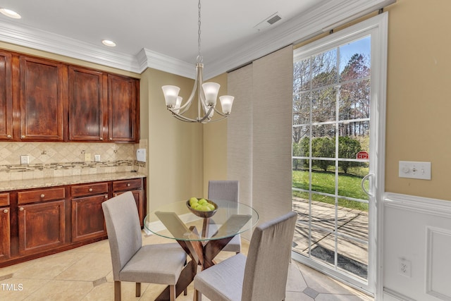 dining room featuring visible vents, an inviting chandelier, light tile patterned flooring, recessed lighting, and ornamental molding