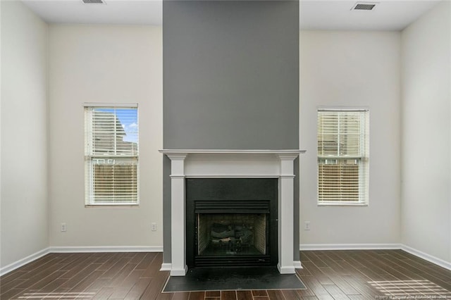 interior details featuring hardwood / wood-style flooring