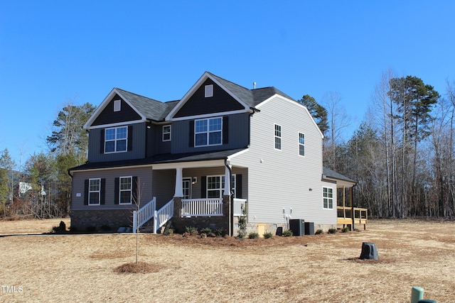 view of front of house featuring central air condition unit and a porch