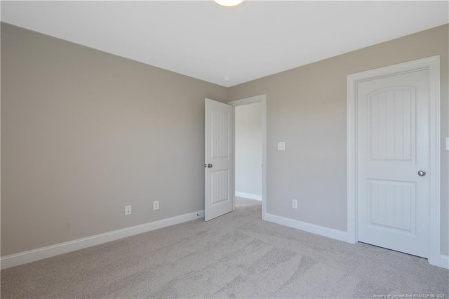 363 Lyman Dr, Fayetteville, NC 28312 - unfurnished bedroom featuring light carpet