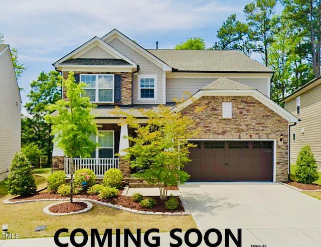 craftsman-style home with a garage and a porch