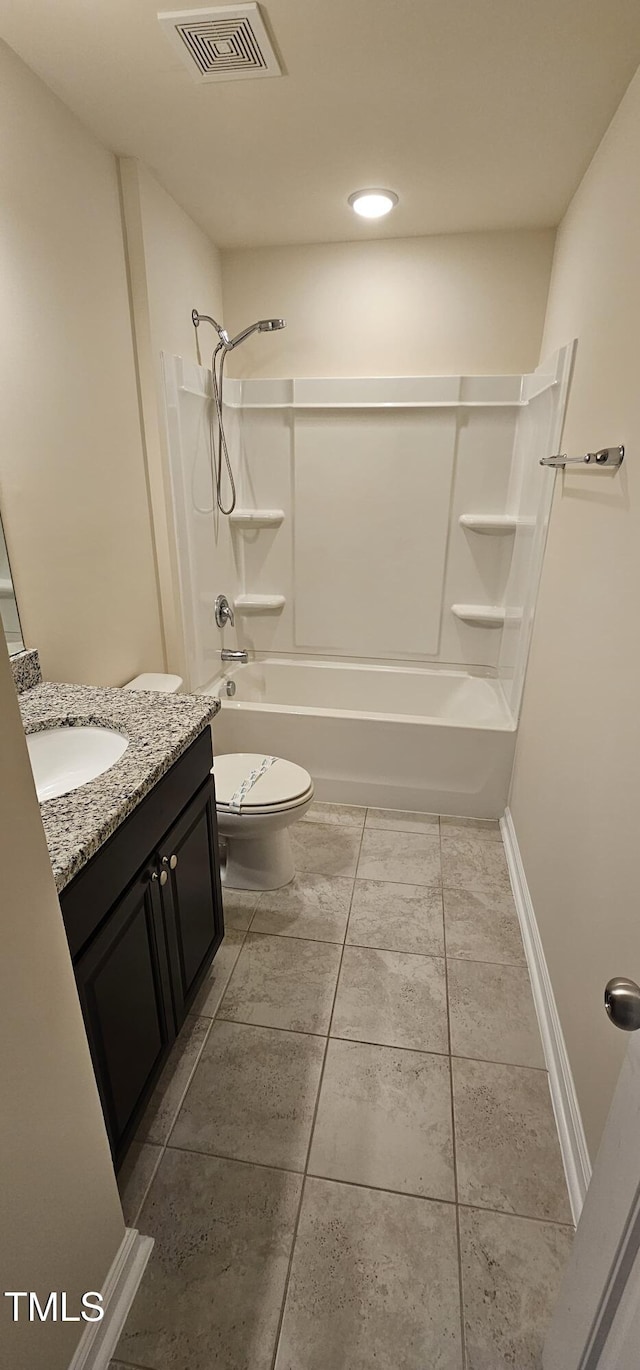 full bathroom featuring shower / washtub combination, toilet, and vanity