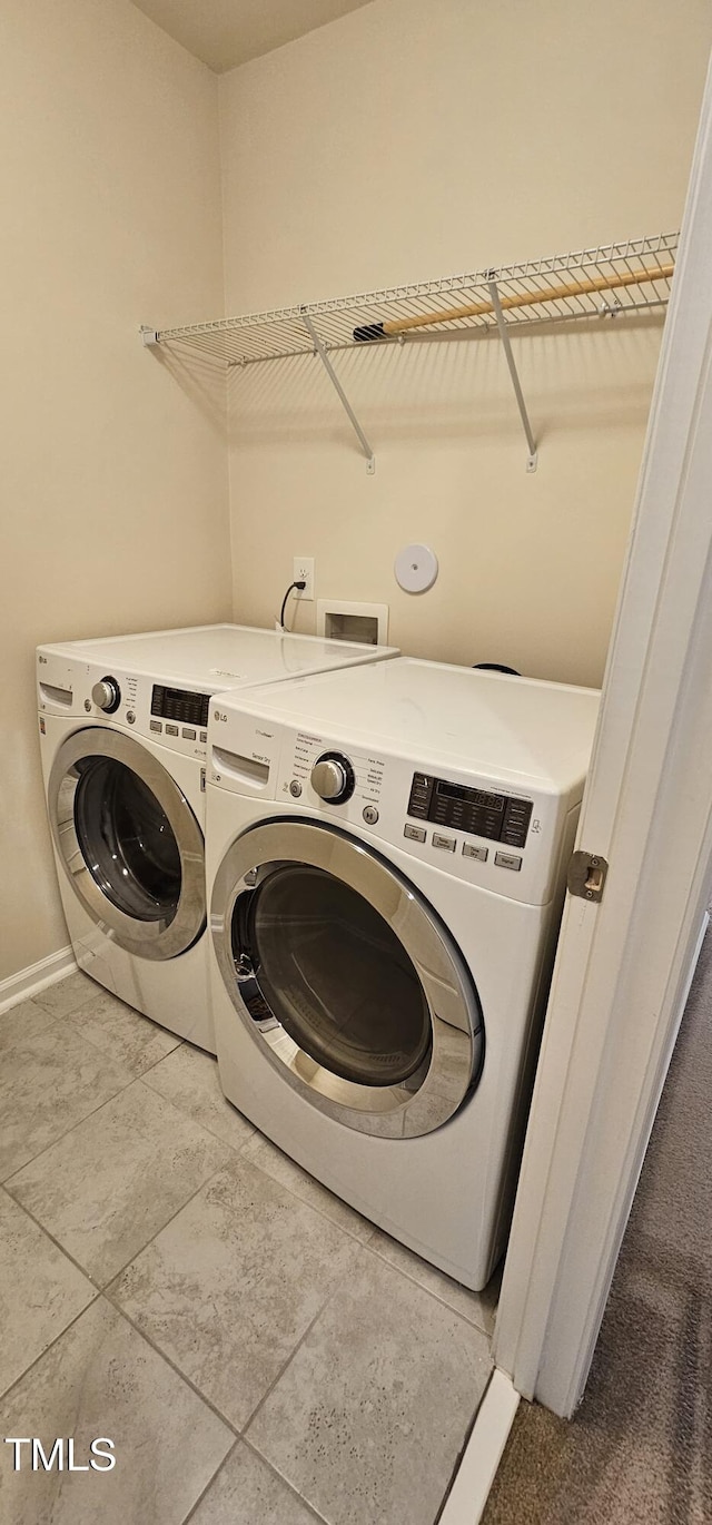 laundry room featuring washer and dryer