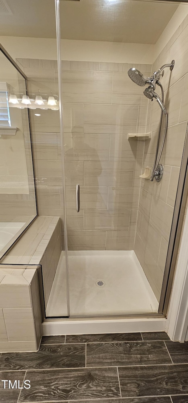 bathroom with an enclosed shower