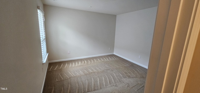 view of carpeted spare room