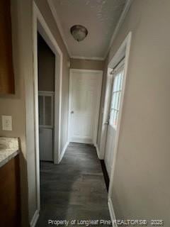 corridor featuring crown molding