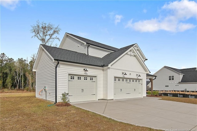 exterior space featuring a yard and a garage