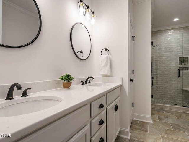 bathroom featuring vanity and a shower with shower door