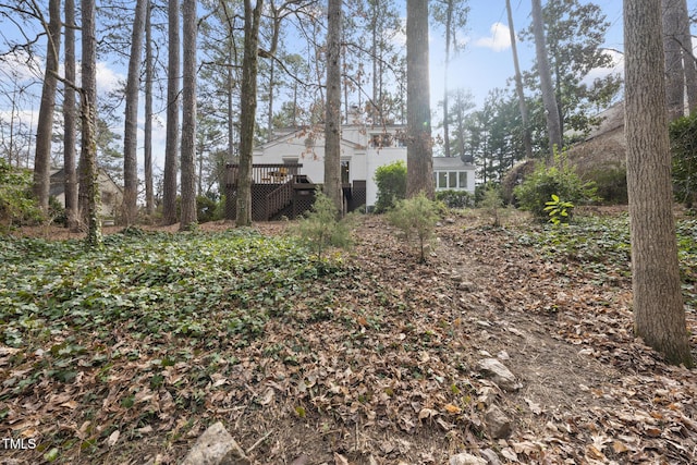 view of yard featuring a deck