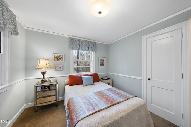 carpeted bedroom with crown molding