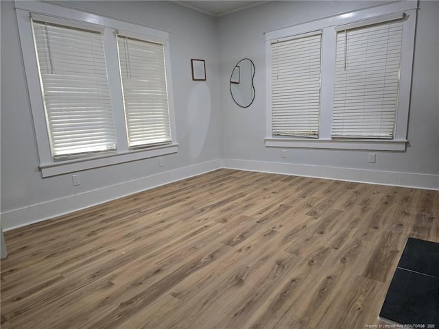 empty room featuring hardwood / wood-style flooring