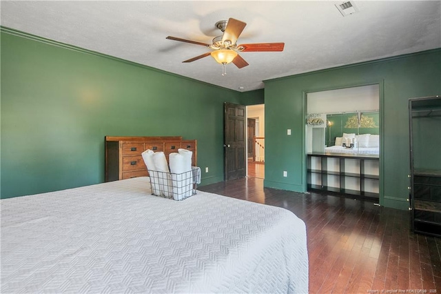 bedroom with dark wood-type flooring and ceiling fan