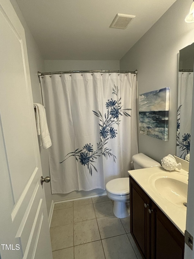 full bathroom featuring tile patterned flooring, vanity, shower / bath combination with curtain, and toilet