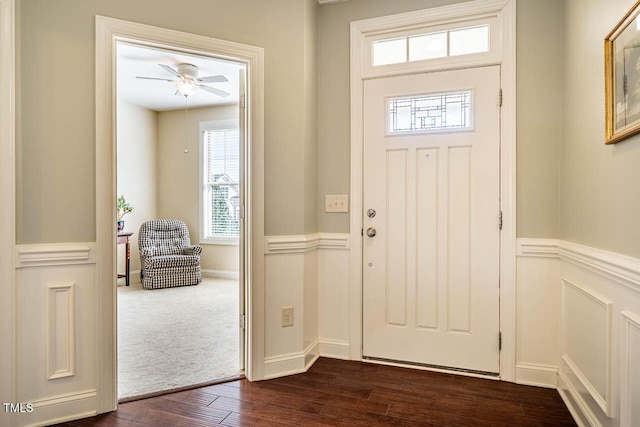 entrance foyer featuring ceiling fan and dark hardwood / wood-style flooring