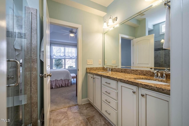 bathroom with vanity and an enclosed shower