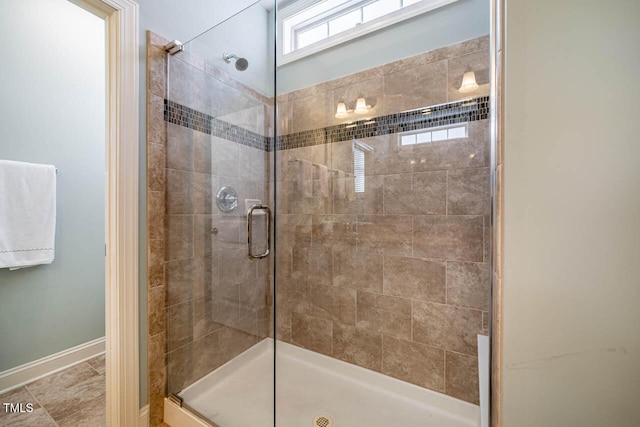 bathroom with an enclosed shower