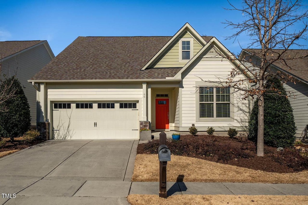 craftsman-style home with a garage