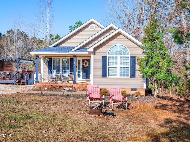 view of front of home featuring a pergola and covered porch