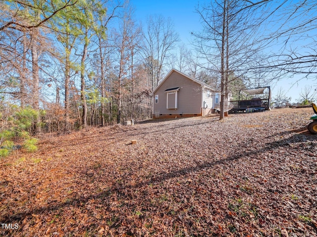 view of yard featuring a deck