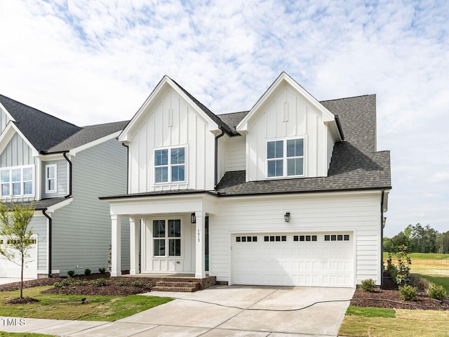 1813 Bright Lantern Way, Wendell, NC 27591 - modern farmhouse style home featuring board and batten siding, concrete driveway, covered porch, an attached garage, and a shingled roof