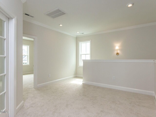 1813 Bright Lantern Way, Wendell, NC 27591 - unfurnished room with ornamental molding, carpet flooring, baseboards, and recessed lighting