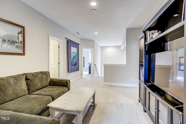 living room featuring light carpet