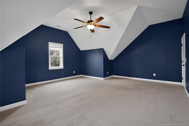 bonus room featuring vaulted ceiling, ceiling fan, and carpet