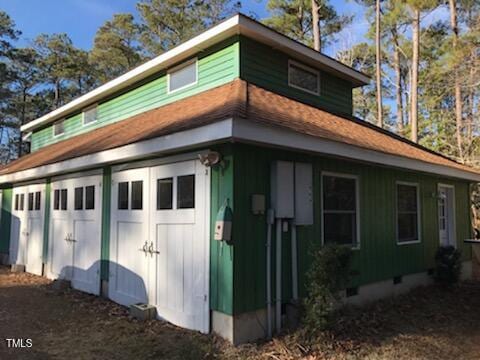 exterior space with a garage