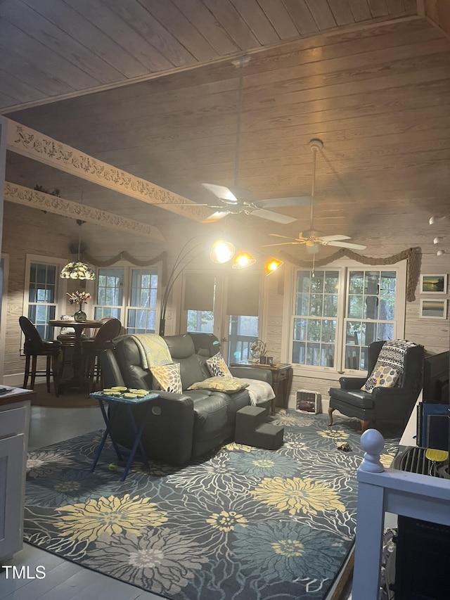 living room with lofted ceiling and wood ceiling