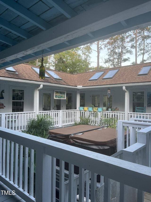 exterior space featuring a hot tub