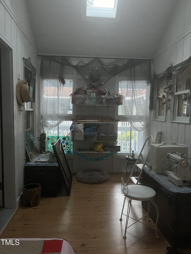 interior space featuring vaulted ceiling and hardwood / wood-style floors