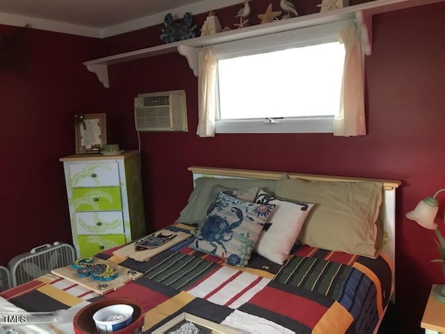 bedroom with a wall mounted AC