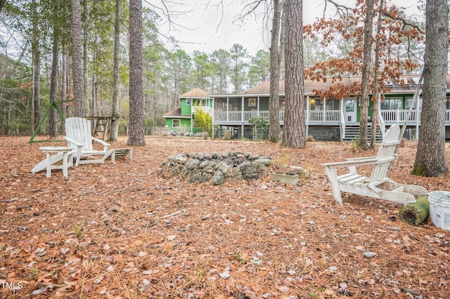 view of yard with a sunroom